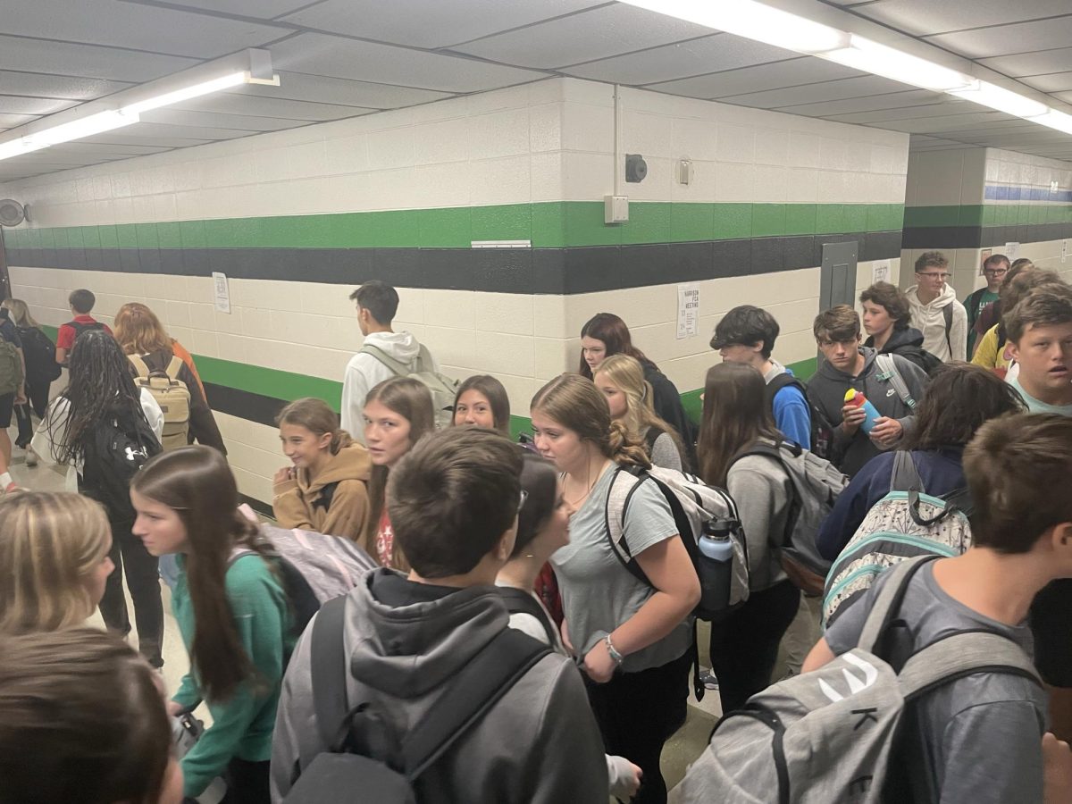 In between classes, the hallways of Harrison High School can be crowded, including the intersection right outside Mr. Miebers' Office.