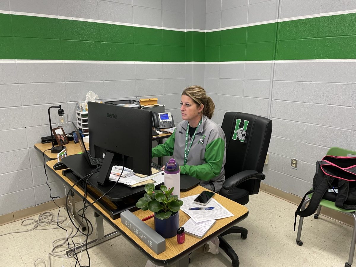 Kauffman sitting at her desk