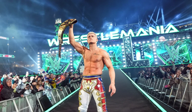 Cody Rhodes holds up his title after his match at Wrestlemania 40