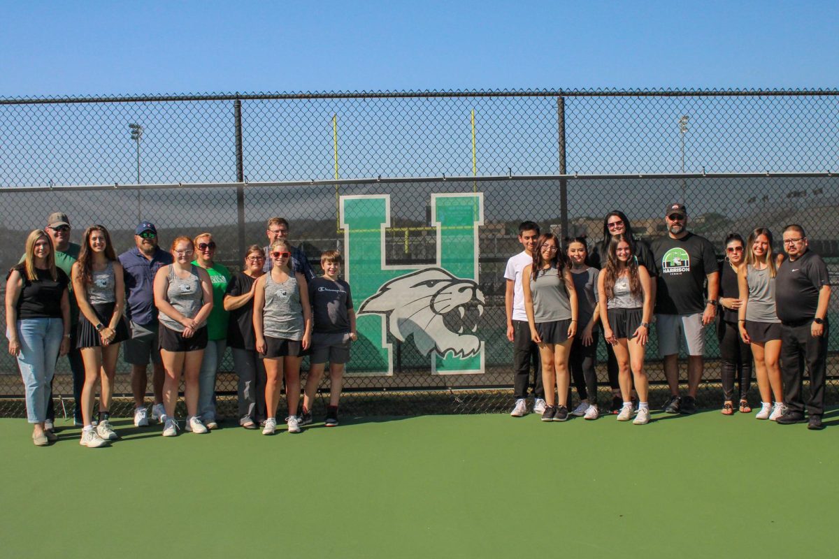 Senior Tennis players with their families.