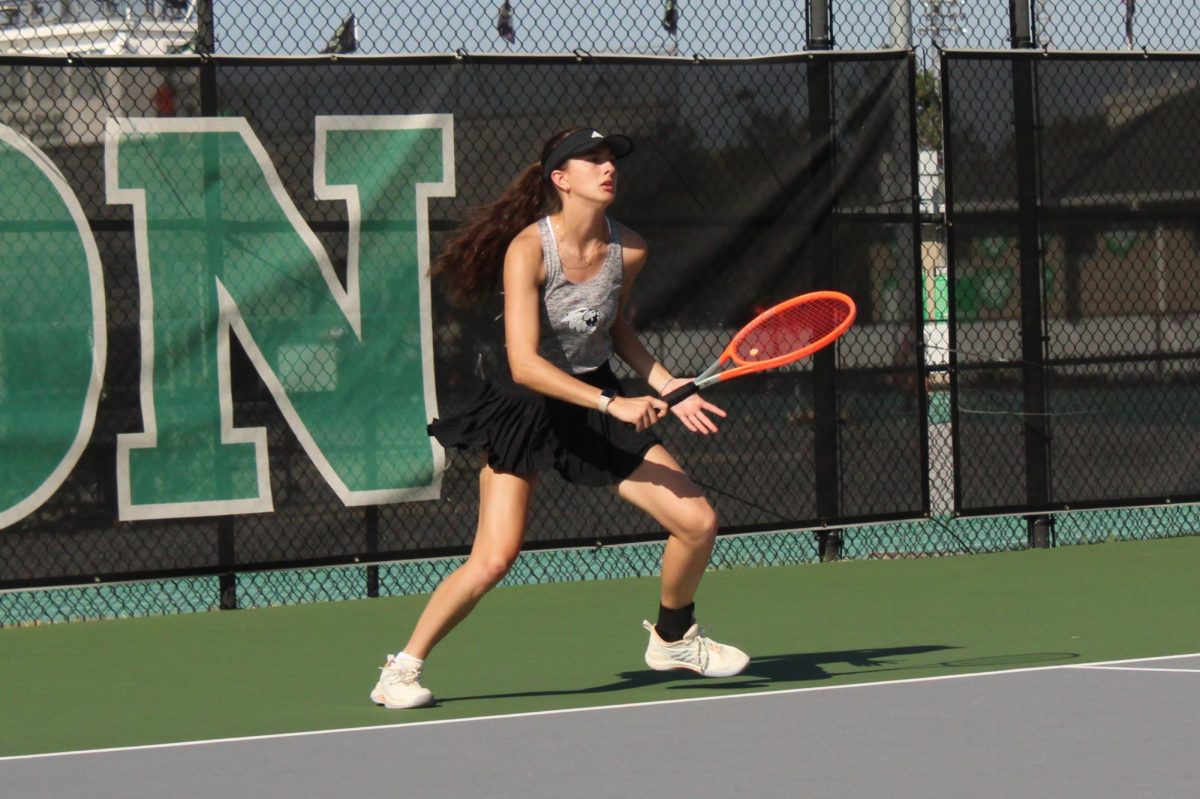 Senior, Catherine Nash, ready for a serve!