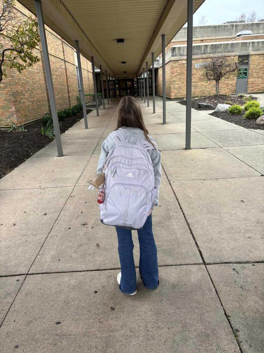 When the backpack is roughly the same size as the student, you know there are some rough waters ahead for this guppy.