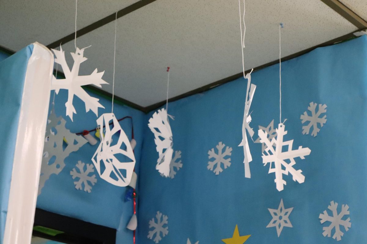 DIY snowflakes designed by students hung outside of Mrs. Bridget Adams' classroom.