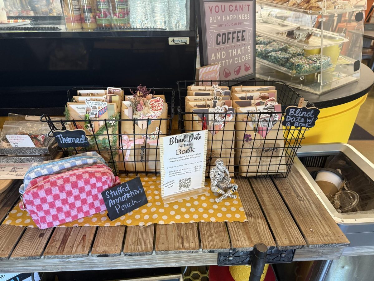 Olivia's books and annotation pouches displayed at Java Jackets.