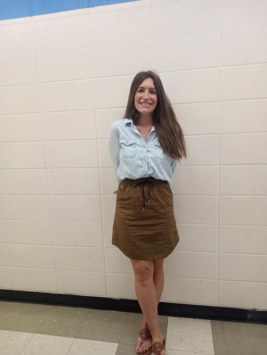 Mrs. Cummings shows off one of her stylish outfits.