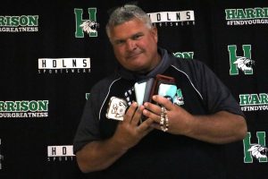 Mr. Roth with a collection of phones from A lunch
