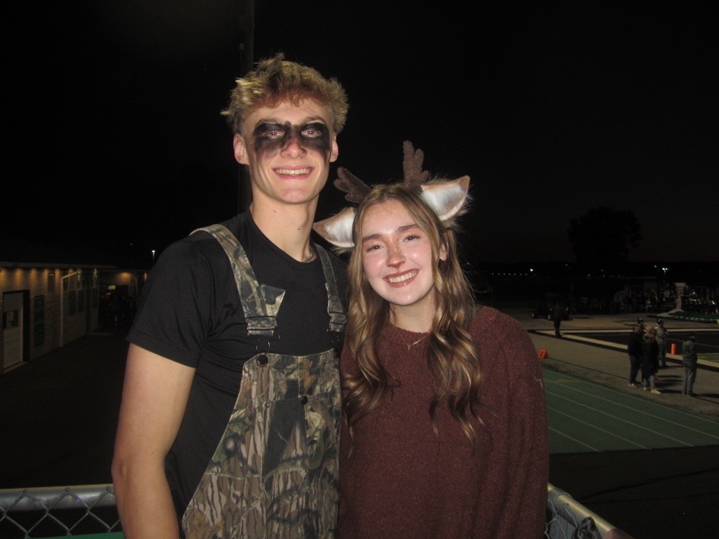 Avery Dennis dresses as a dear and a hunter