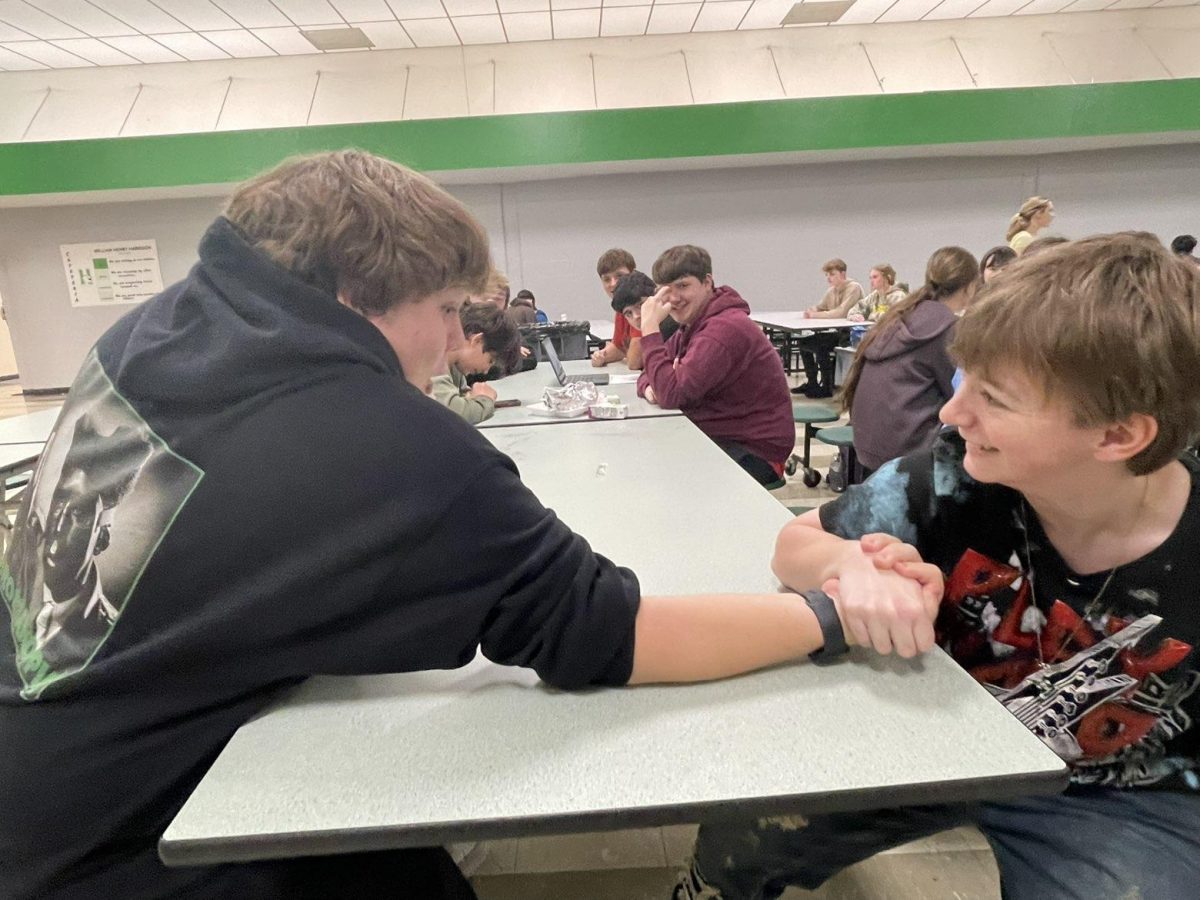 Stewart smiling as he beats another opponent. 