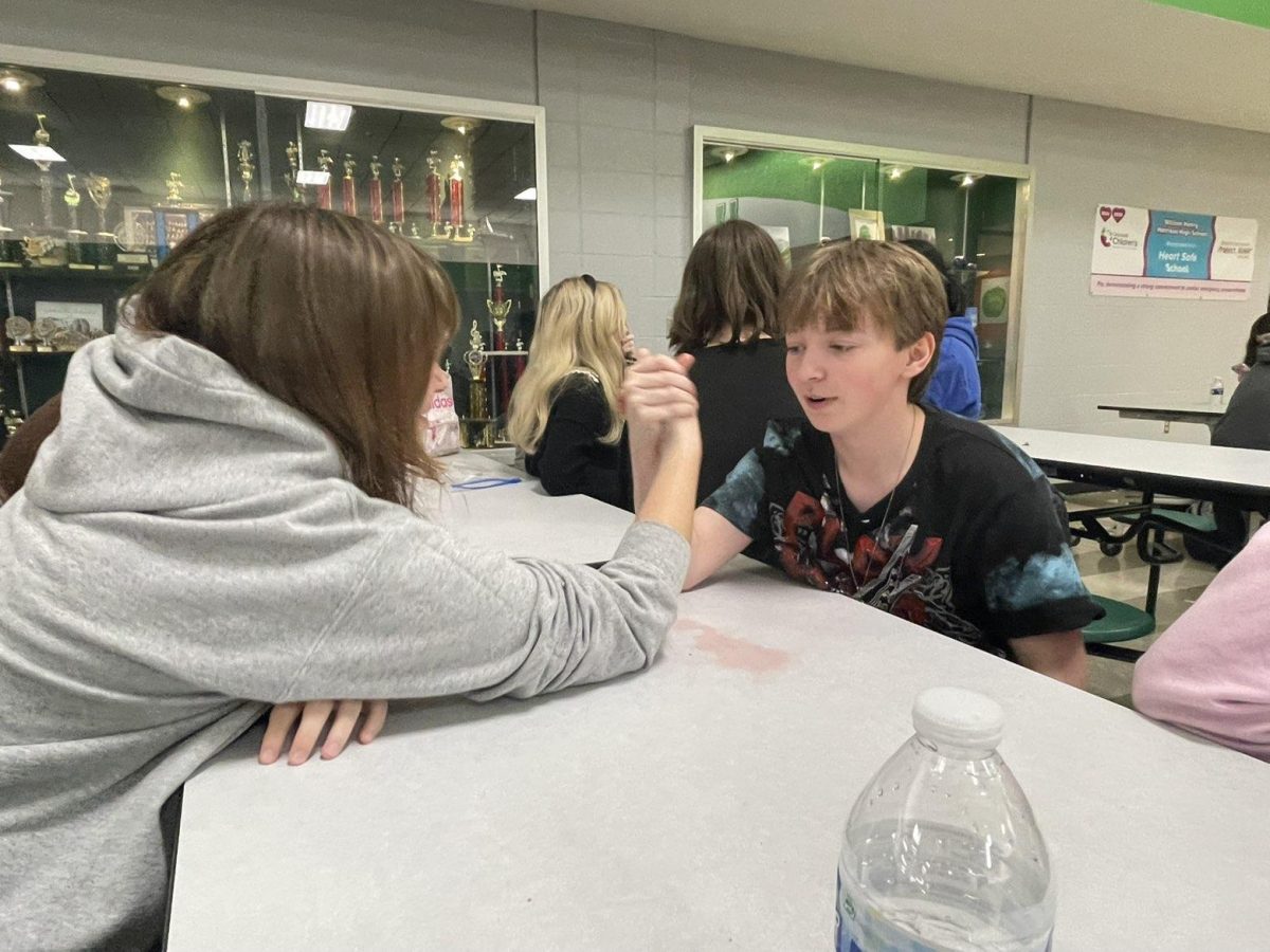 Stewart explaining why he needs pictures for an arm-wrestling match during one with another one of his friends. 