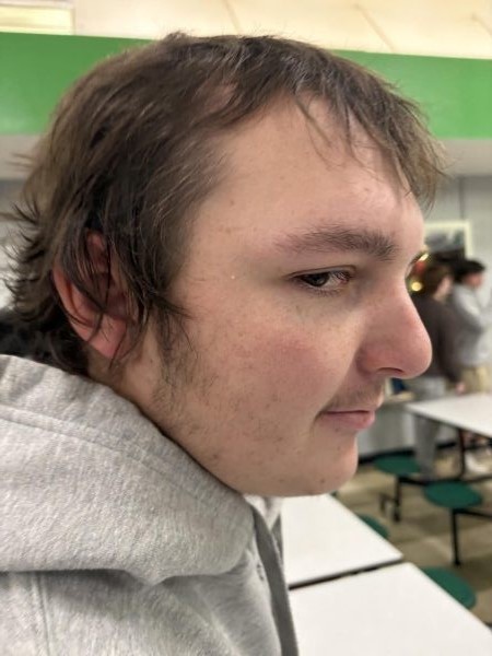 Parker woy - showing off an eye sore of a hair day but has no care in the world.