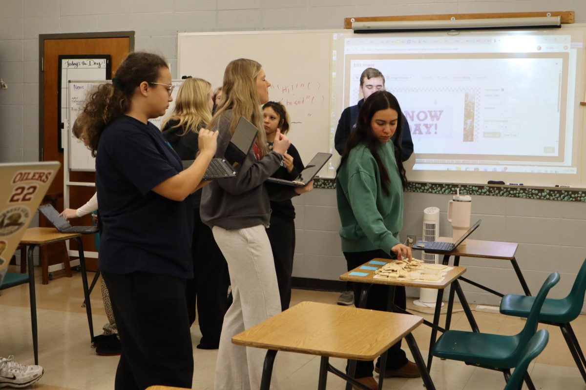 5th bell Journalism students trying toaster pastries while writing their opinions