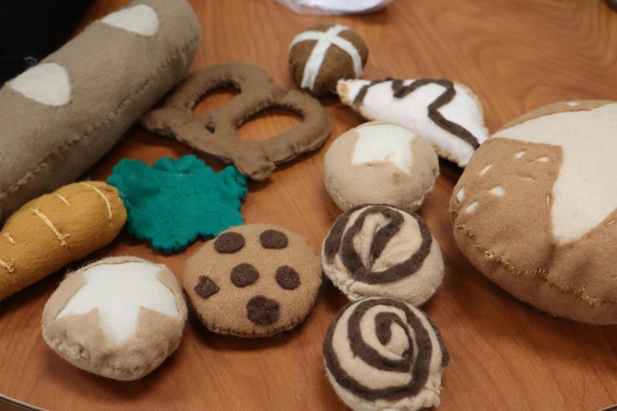 The Baker's bread and sweets unknowingly about to be taken by Little Red