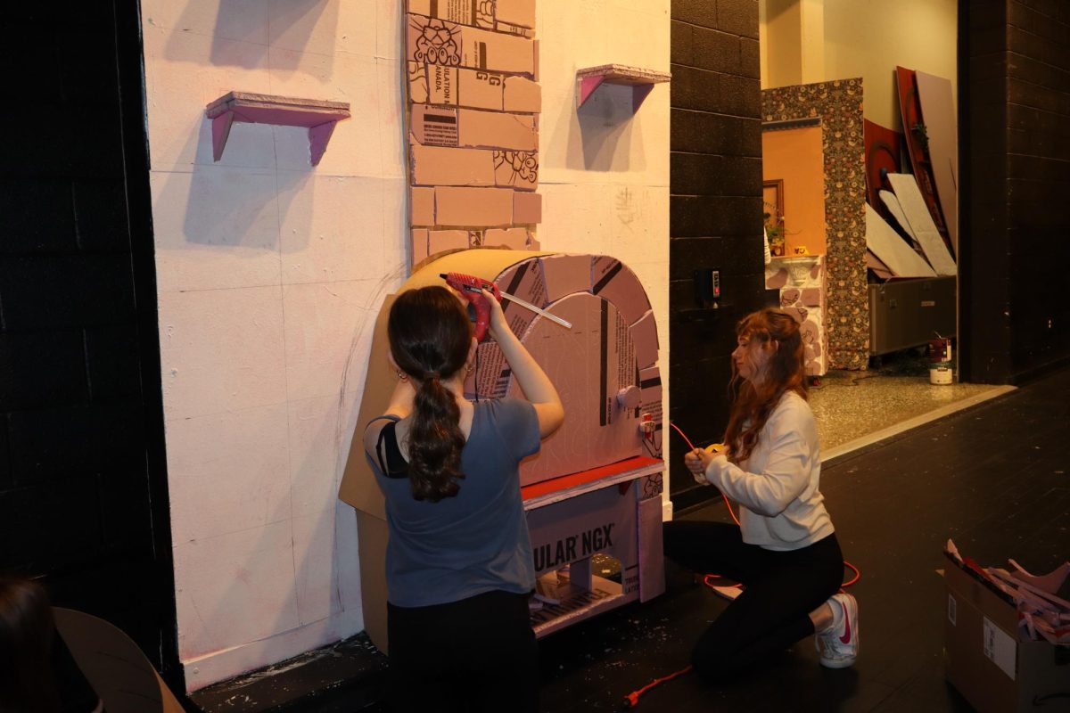 Alex Mazzei and Ainsley Nolan hard at work putting together the baker's house