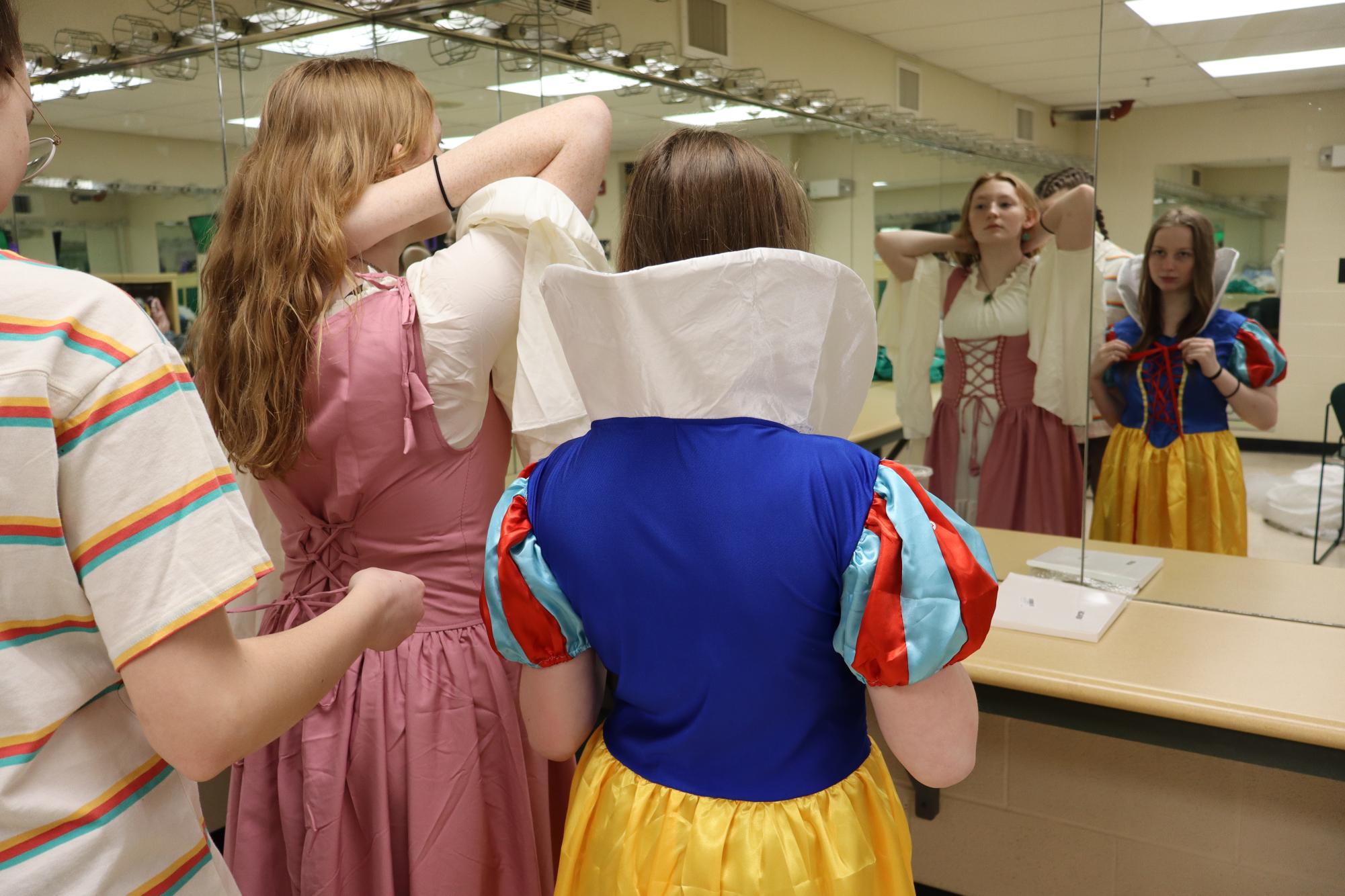 Actors Liv Daniel and Karlie Farris get into costumes for costume check day