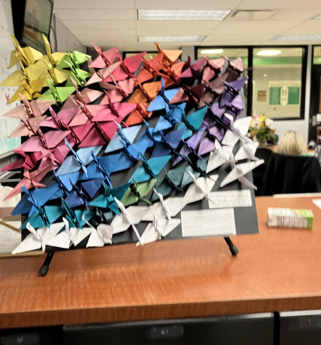 The Mr. Coffman origami memorial in the front office.